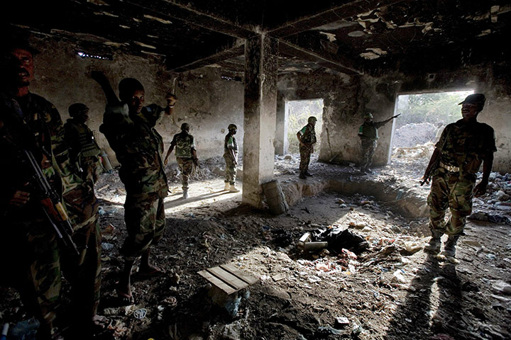24 hours in pictures: MISOM forces at a damaged building in Mogadishu