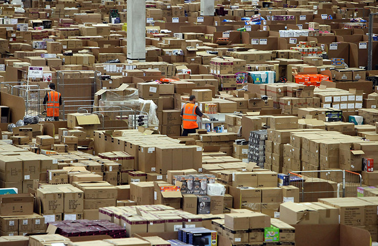 Business Week in Pictures: Amazon Warehouse Employees Prepare For Their Busiest Time Of Year