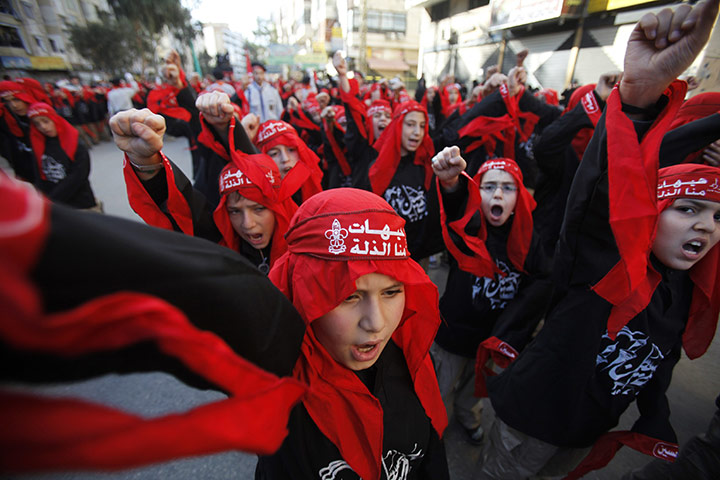 Shia Ashura Update: Lebanese Shi'ite Muslim children chant slogans during a Muharram procession