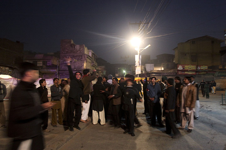 Shia Ashura Update: Pakistani Muslims chant anti government slogans at the site of explosion
