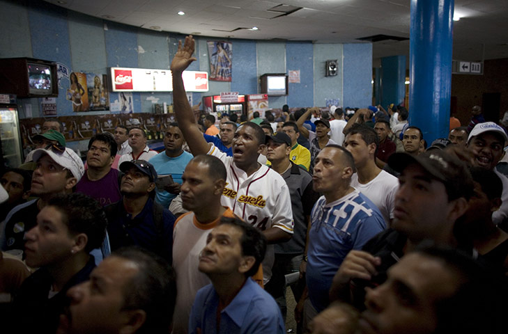 Fromtheagencies Cubillos: Fans gesture during the Caribbean Classic Series Caracas