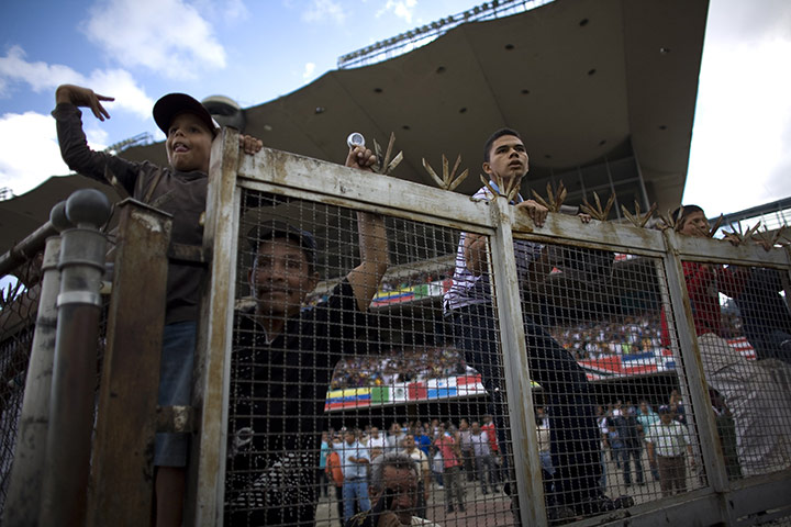 Fromtheagencies Cubillos: Fans watch a horse race in Caracas Venezuela