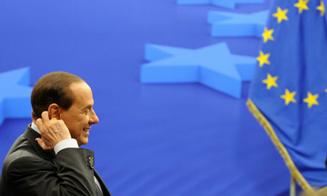 Silvio Berlusconi at the EU summit where embarrassing tweets about him appeared on giant screens