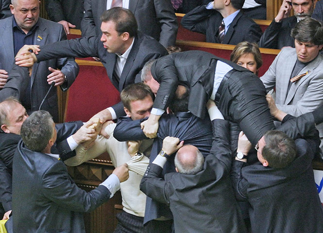 Parliamentary Brawls: Ukrainian parliamentarians scuffle in the Parliament's hall in Kiev