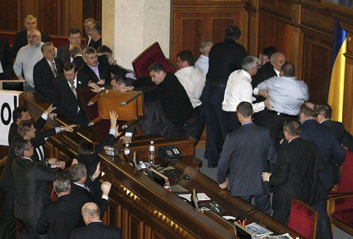 Parliamentary Brawls: Deputies scuffle during a session in the chamber of Ukrainian parliament