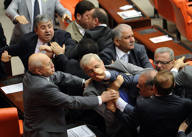 Parliamentary Brawls: Members of parliament scuffle at a parliamentary session in Ankara