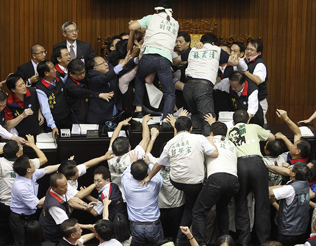 Parliamentary Brawls: Opposition DPP legislators scuffle with ruling KMT legislators in Taiwan