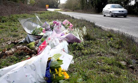 Floral tributes at the scene of a car crash