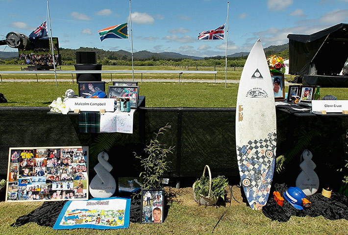 Personal items and photographs at New Zealand miners memorial service