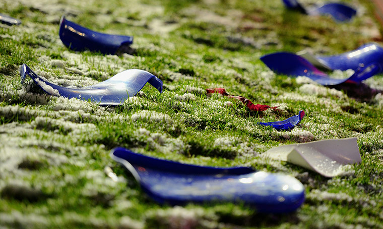 24 hours in pictures: Broken seats lay on the pitch, Birmingham