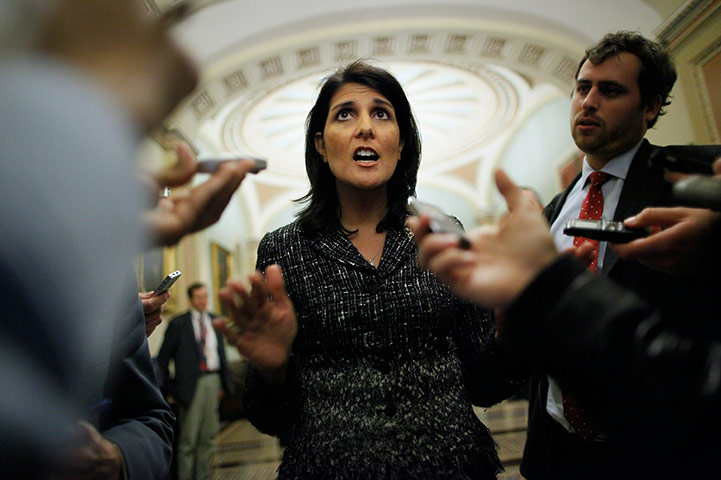 24 hours in pictures: South Carolina Governor-elect Kikki Haley talks to reporters after meeting