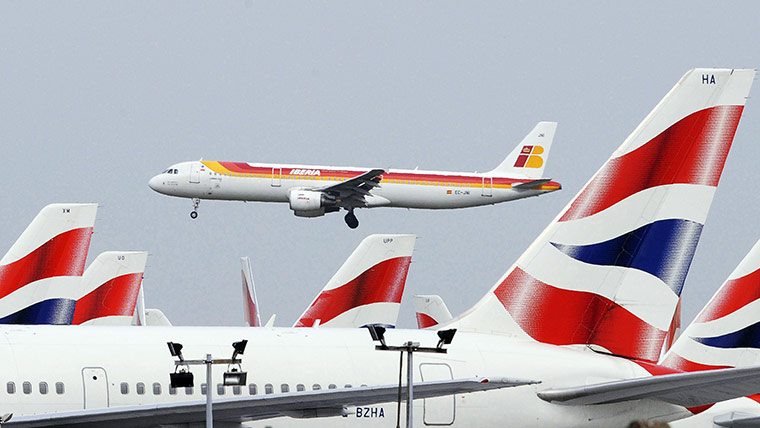 Week in business: Iberia Airlines Airbus 321 passenger jet over British Airways aircraft 