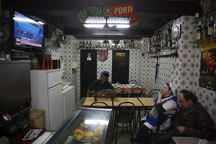 2018 and 2022 reaction: People in a Lisbon restaurant watch the result of the 2018 World Cup bid 