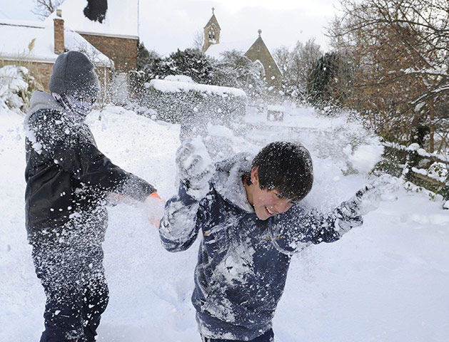 Winter weather: Youths throw snowballs in Stamford Bridge