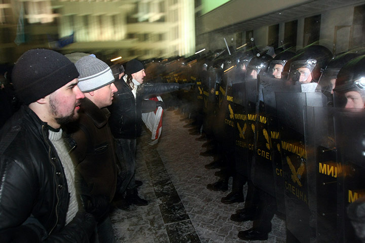 Belarus election violence: Protesters clash with riot police during a rally in Minsk