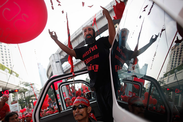 24 hours: Thai man wearing a face mask joins fellow anti-government protester