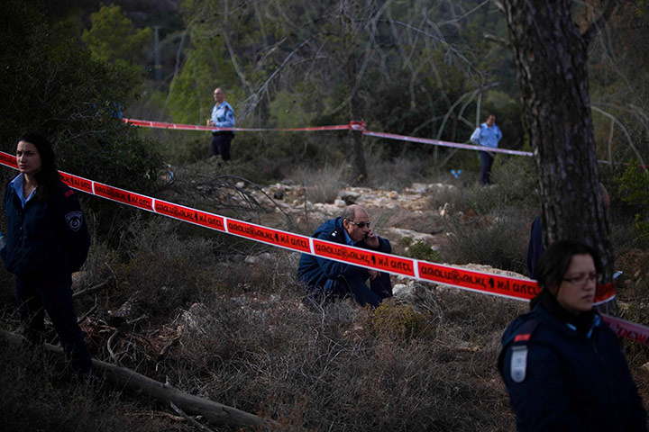 24 hours: Israeli police stand guard near the body of US tourist Christine Logan
