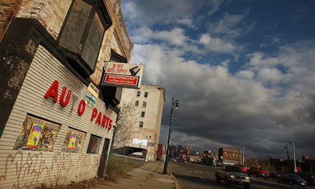 Shuttered businesses line a downtown street in Detroit, Michigan