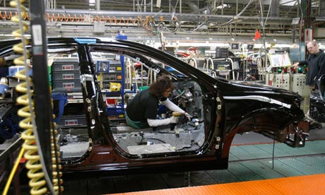 An accelerator is installed into a Toyota Camry in Georgetown, Kentucky, February 2010