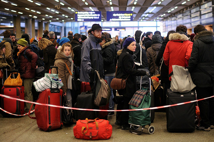 Travel Chaos: Passengers queue at the Eurostar train terminal, at St Pancras