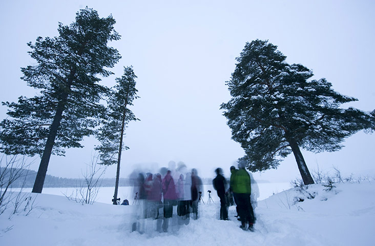 Lunar Eclipse: People wait for the Lunar eclipse near the village of Vuollerim