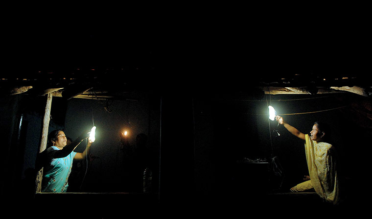 24 hours in pictures: Solar energy used to light up lamps in Morabandar village