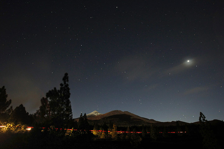 Lunar Eclipse: The volcano Teide is pictured during a total lunar eclipse