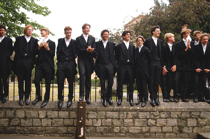 School Uniforms: A line of young students from Eton College in typical formal uniform