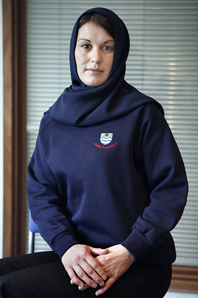 School Uniforms: A young woman models an officially approved School uniform Hijab