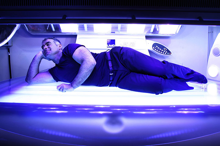 Tommy Sheridan: 2007: Former Scottish politician Tommy Sheridan poses on a sunbed