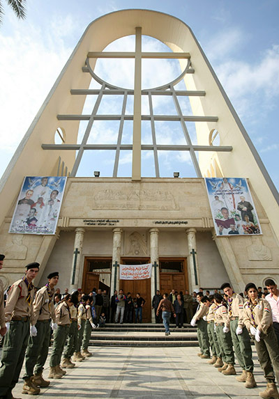 Christian in Middle East: Iraqi Christian scouts stand outside the Sayidat al-Nejat church