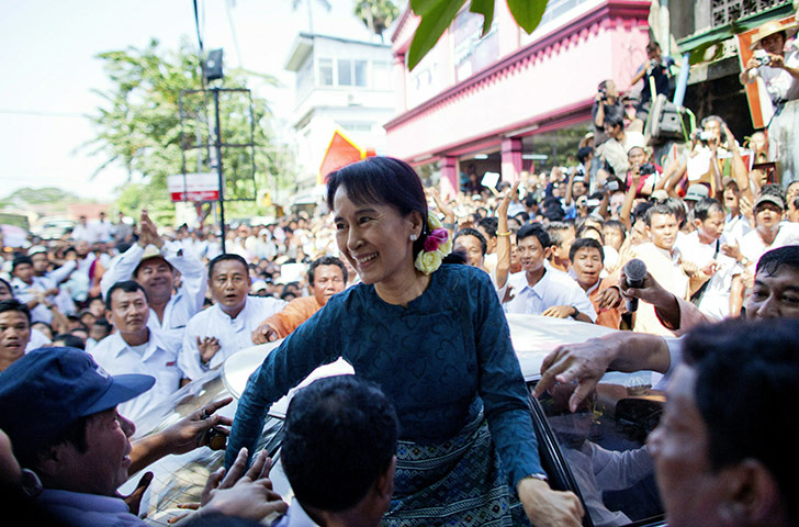 2010: year in pictures: Aung San Suu Kyi greeted by her supporters in Rangoon after being released