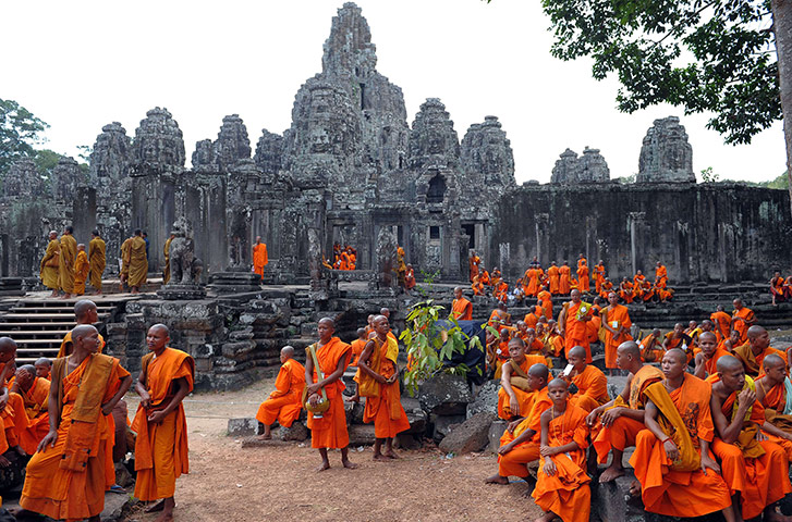 2010: year in pictures: Cambodian monks at the Bayon temple celebrate Buddha's birthday