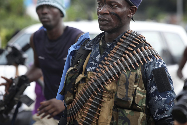 Week in Business: Rebel soldiers in Abidjan, Ivory Coast