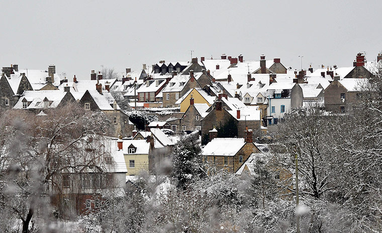 Week in Business: Snow covers rooftops in Malmesbury, Wiltshire
