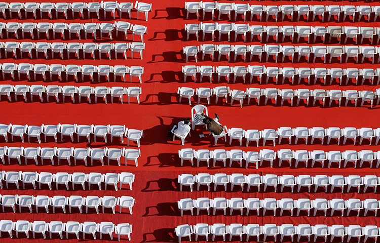 24 hours in pictures: Two Indian men play chess during an attempt to create a world record