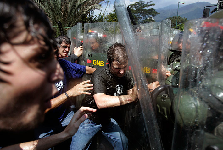 24 hours in pictures: Demonstrators clash with soldiers at the Central University of Venezuela