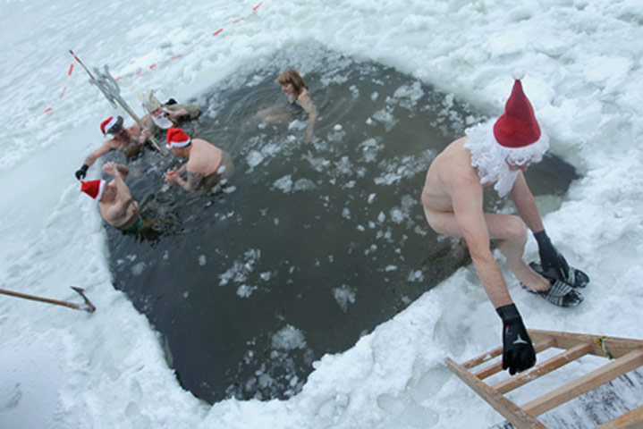 24 hours in pictures: Traditional Christmas Day Ice Swimming