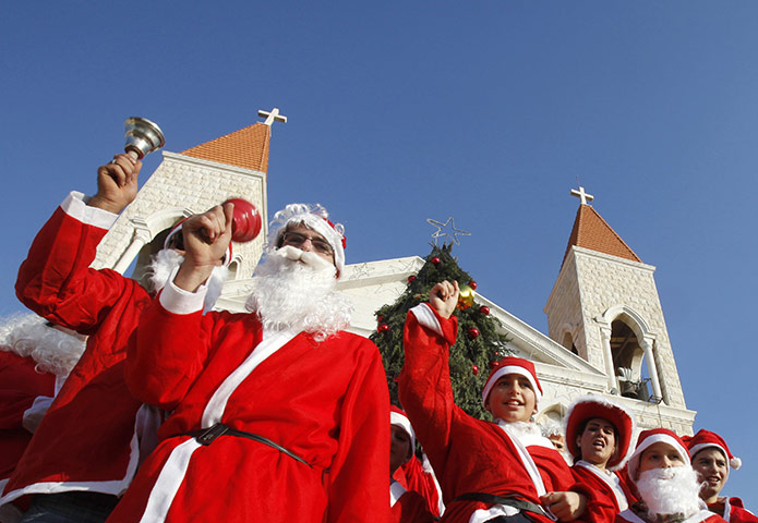 24 hours in pictures: Lebanese Christians dressed as Santa Claus 