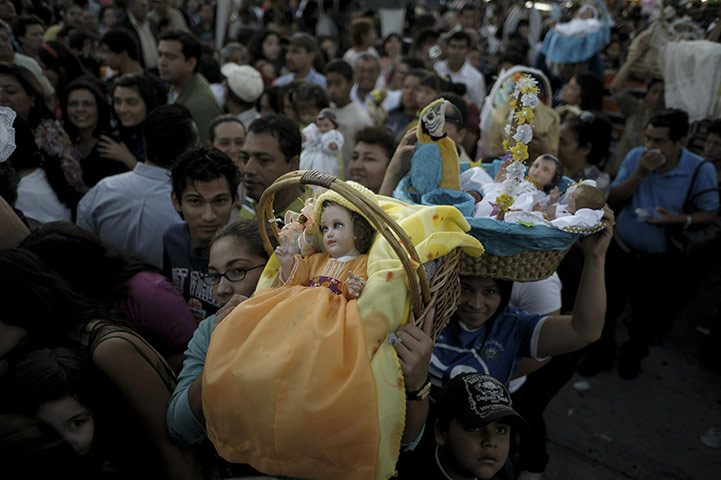 24 hours: Antiguo Cuscatlan, El Salvador: Catholics carry representations of Jesus