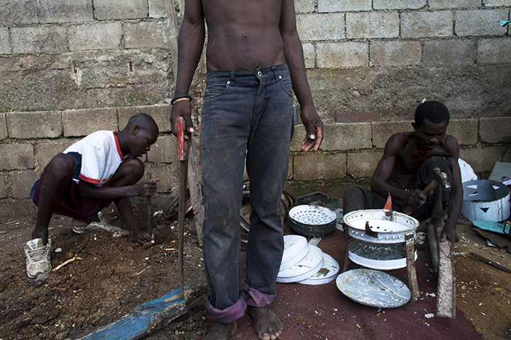 Haiti Cité Maxo: Haitians work to build a home at camp settlement Cité Maxo in Petionville