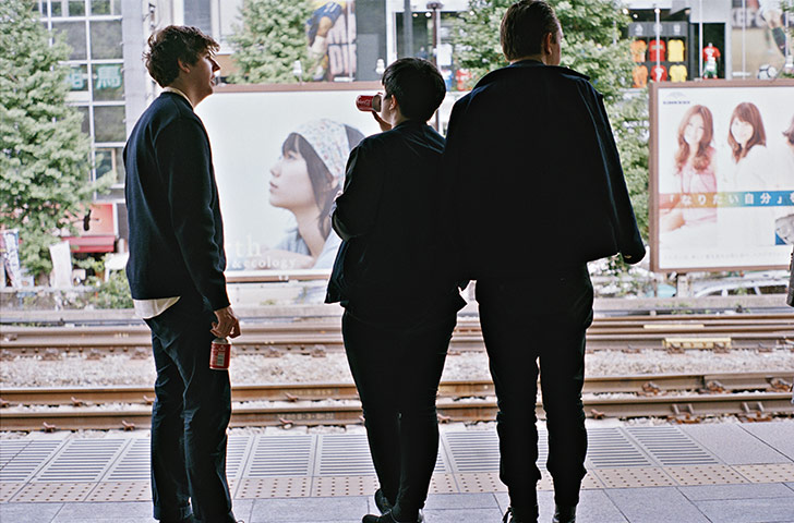 The xx: The xx wait for the local Metro in Tokyo, Japan