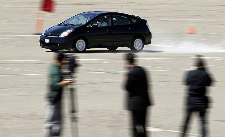 Year in business: A Toyota Prius car is demonstrated breaking at 85 MPH 
