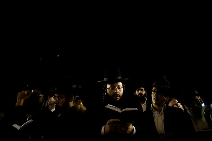 24 hours in pictures: Jewish men pray at the Western Wall in Jerusalem