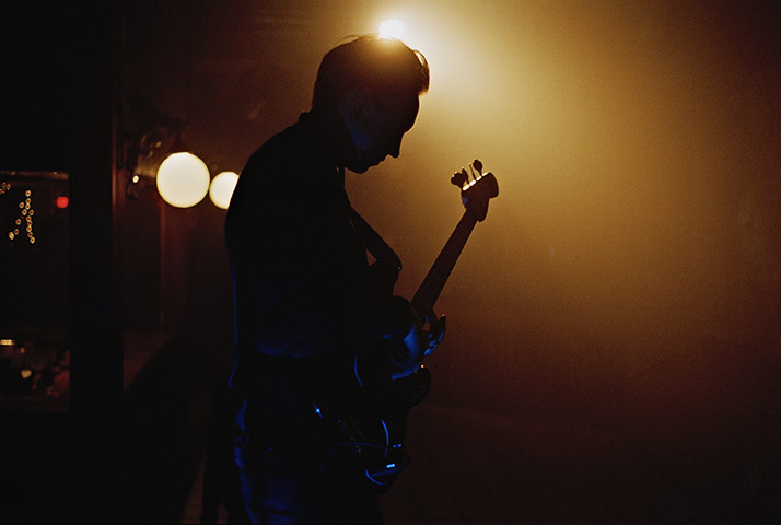 The xx: Oliver Sim in silhouette, soundchecks in Carrboro 