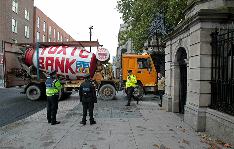 Year in business: Cement mixer truck with Toxic Bank Anglo at Ireland's parliament building