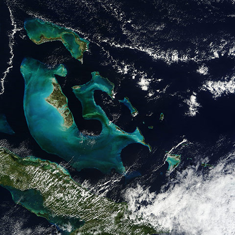 Satellite Eye: bright peacock blue waters surrounding the Bahama Islands
