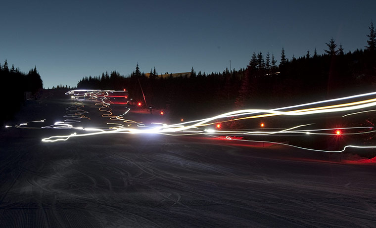 24 hours in pictures: Quebec, Canada: Skiers wear lights as they head downhill