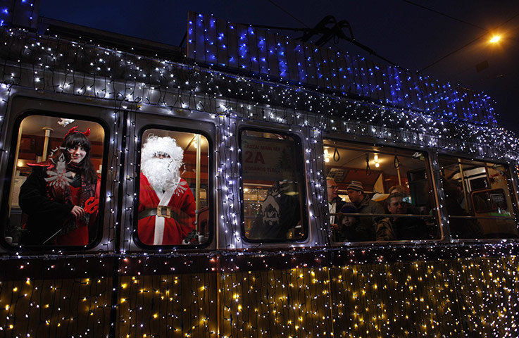 24 Hours: A man dressed as Santa Claus in a tram in Budapest