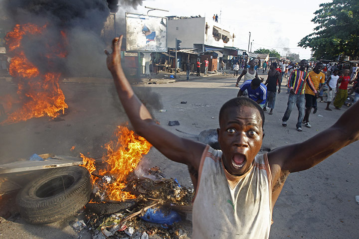 24 Hours: Alassane Ouattara's supporters react as the news spreads that Laurent Gbagbo won